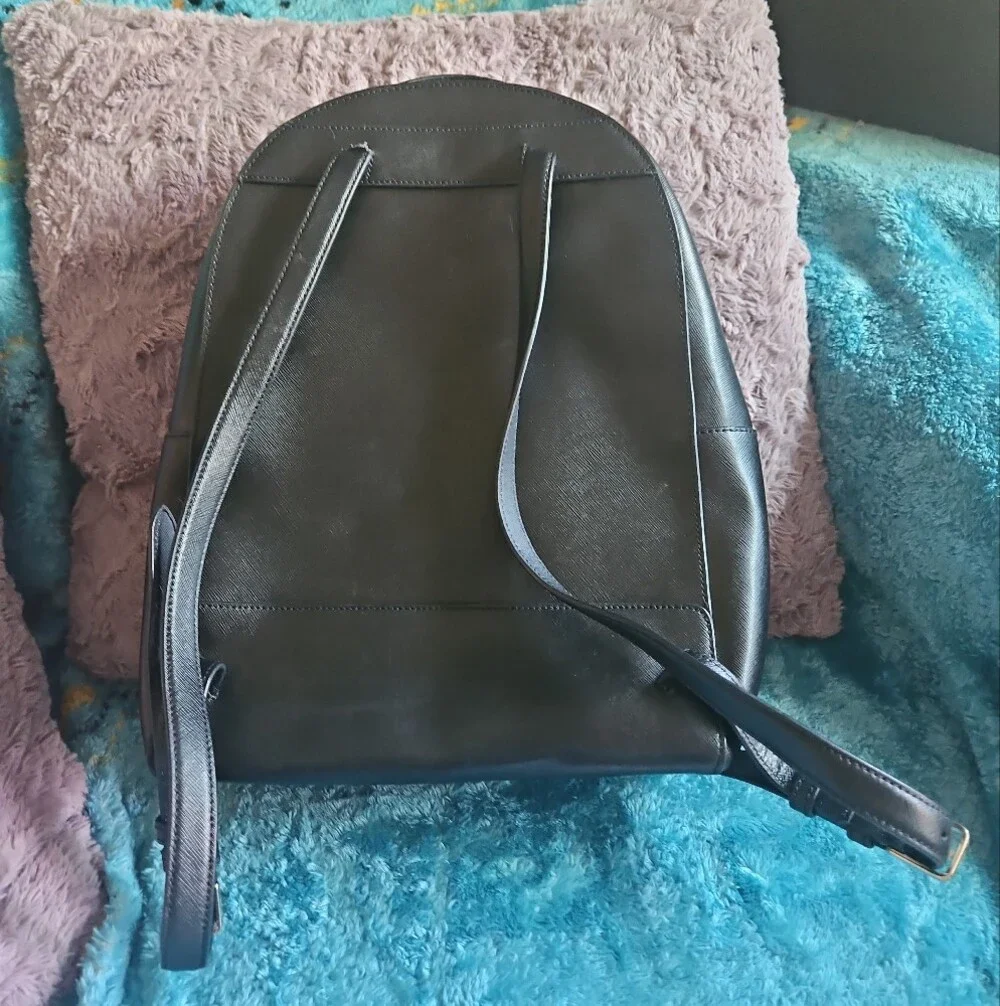 AS-IS Kate Spade black leather backpack LEFT STRAP AT THE TOP TORN. STILL NEW